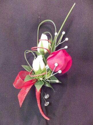 3 Rose Boutonniere <br><span class="local-delivery-disclaimer" style="text-decoration: none; font-size: 0.5em; color: #FF0000;">• Local Delivery Only</span>